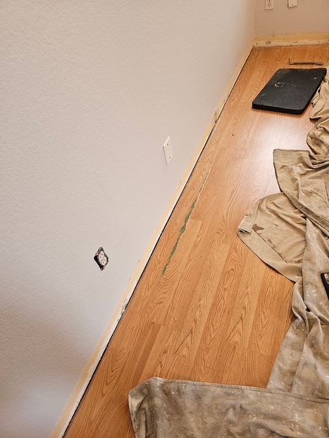 Residential vinyl plank flooring damage restoration