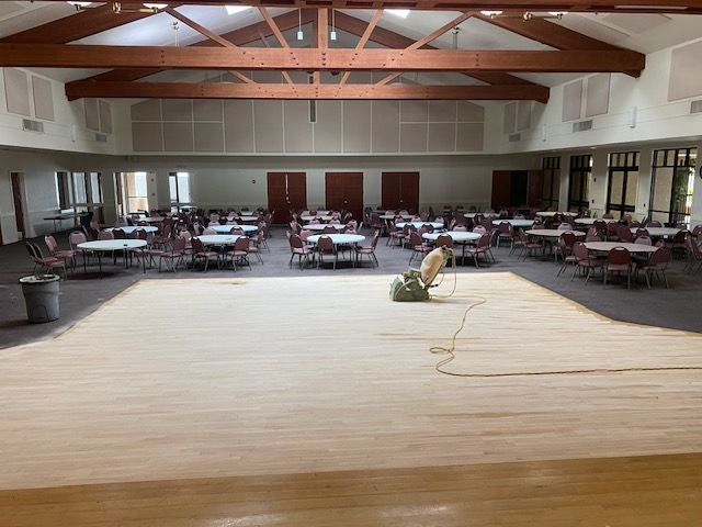 Hardwood floor refinishing with a rich natural wood tone