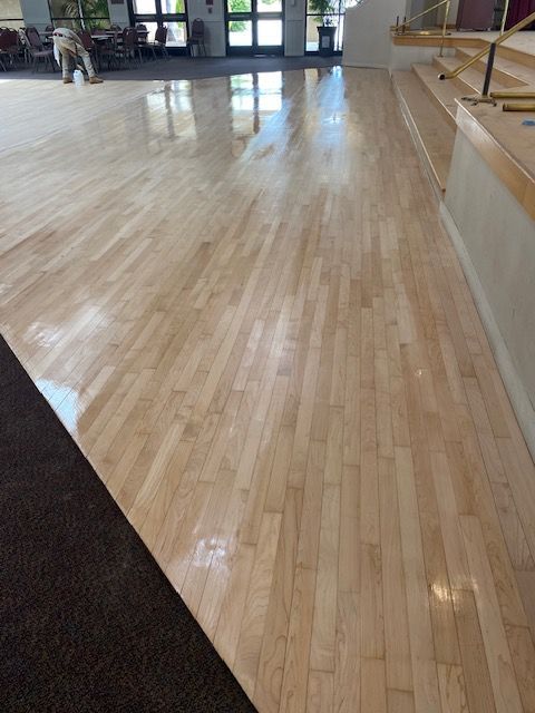 Hardwood flooring being prepared for color finishing
