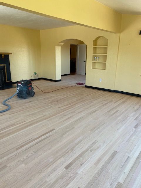 Restoring the appearance of faded hardwood flooring