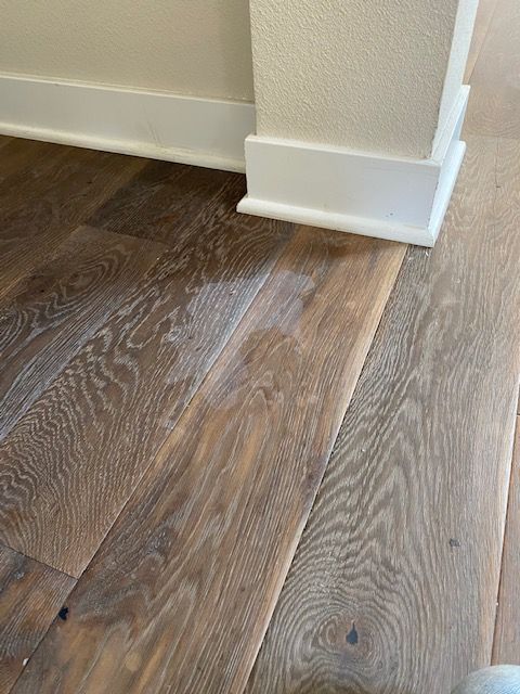 Restored hardwood flooring receiving a professional finish