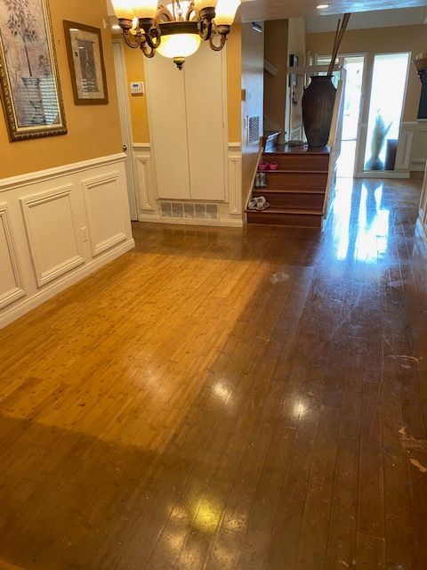 Hardwood floor restoration with an updated wood finish