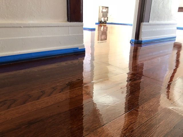 Hardwood floor finish application for long-term surface protection