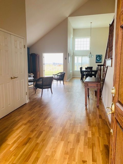 Applying a new finish to worn residential hardwood floors