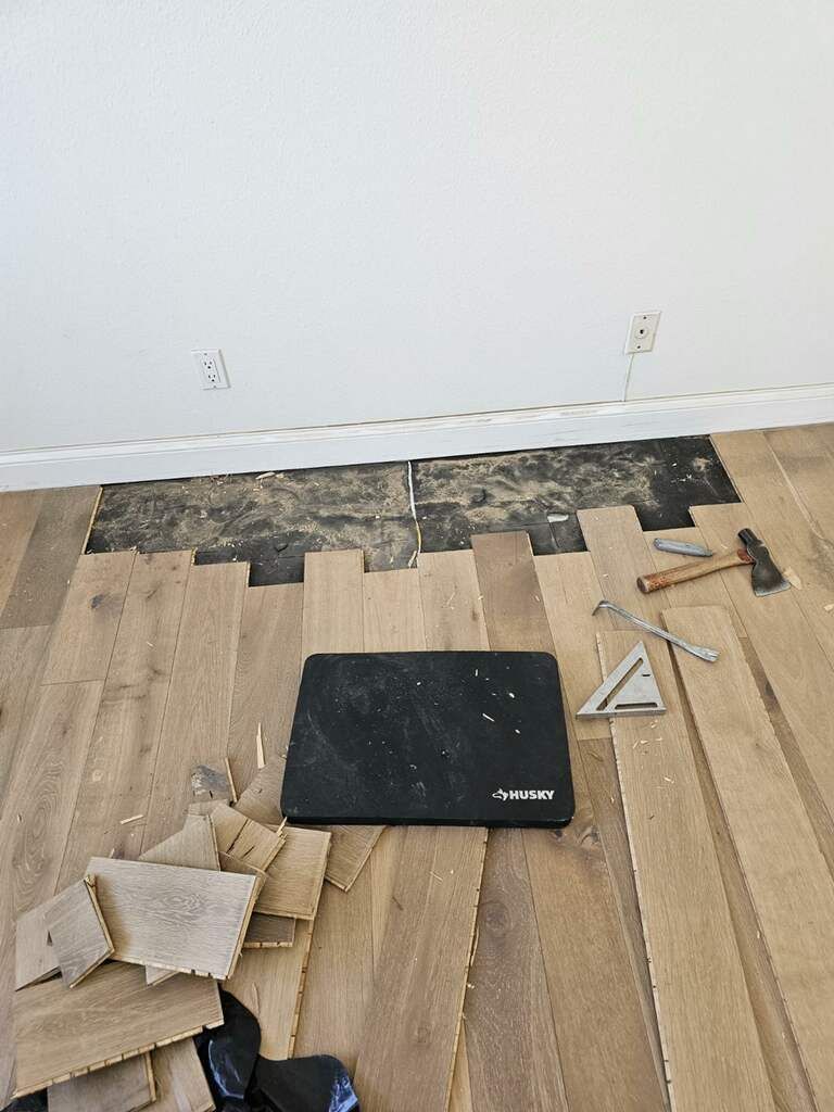 Detailed hardwood floor repair and finish restoration