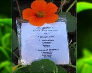 Orange flower above a sign listing Dr. Miller’s herbal tea benefits for weight loss and stomach distress