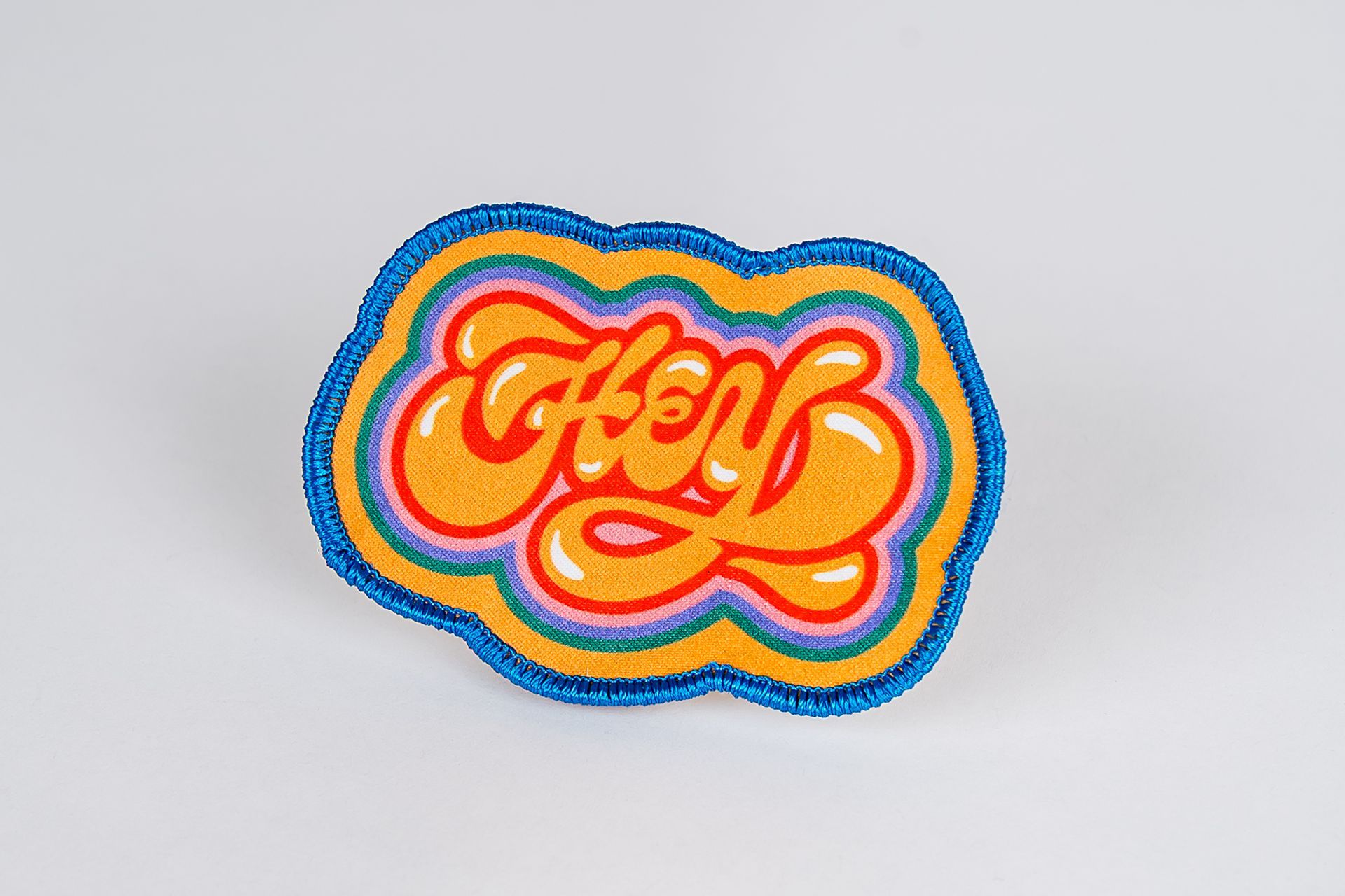 Embroidered patch with the word