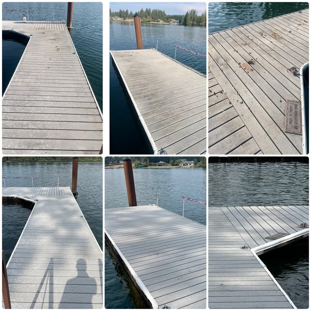 Wooden dock stretching into calm water under a cloudy sky, with white benches along both sides