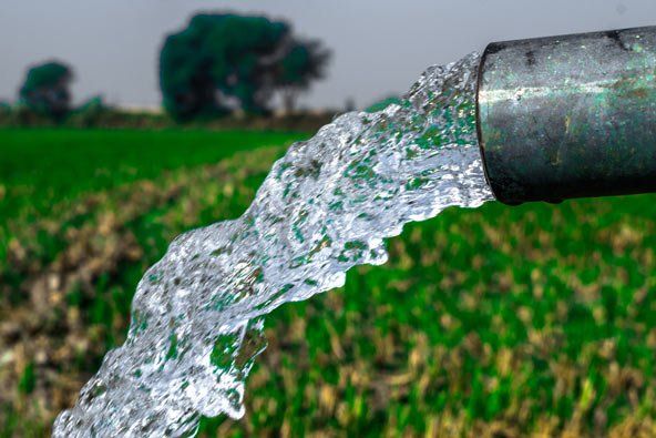 Water Pouring Out Of Pipe — Plumbers in Gatton, QLD