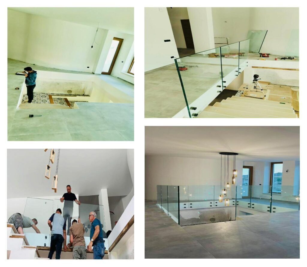 Costruzione di un sistema di ringhiere in vetro per scale. Operai installano pannelli in vetro in una casa moderna.