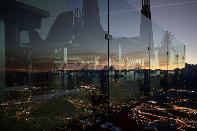 Paesaggio urbano riflesso in un edificio di vetro al tramonto, con le luci degli edifici e la sagoma delle montagne.