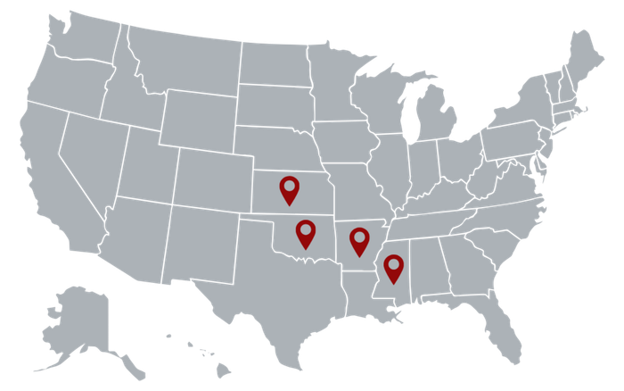 Gray U.S. map with four blue location pins in the Southwest and South Central regions