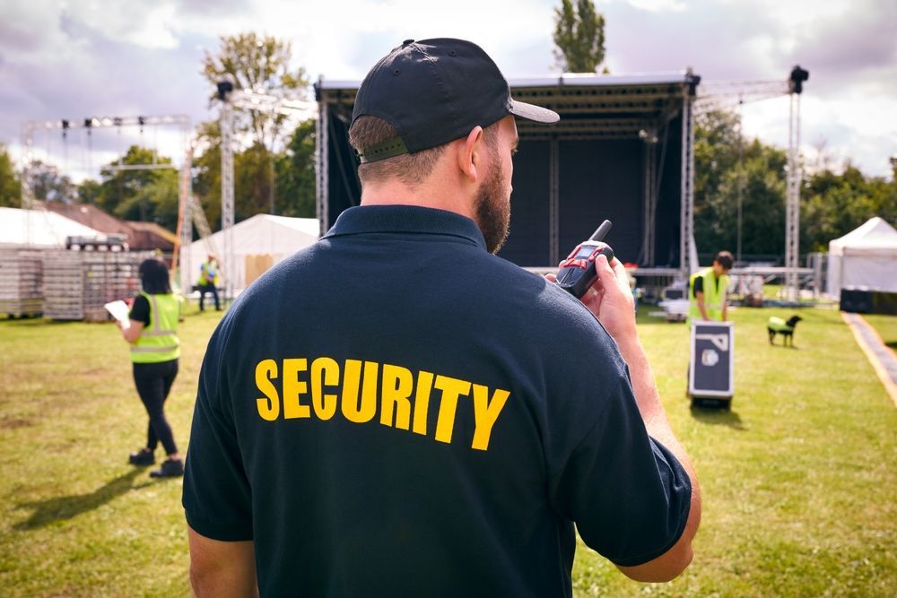 Security Guard at Outdoor Event with Walkie-Talkie — Safe Guard Squad in Byron Bay, NSW