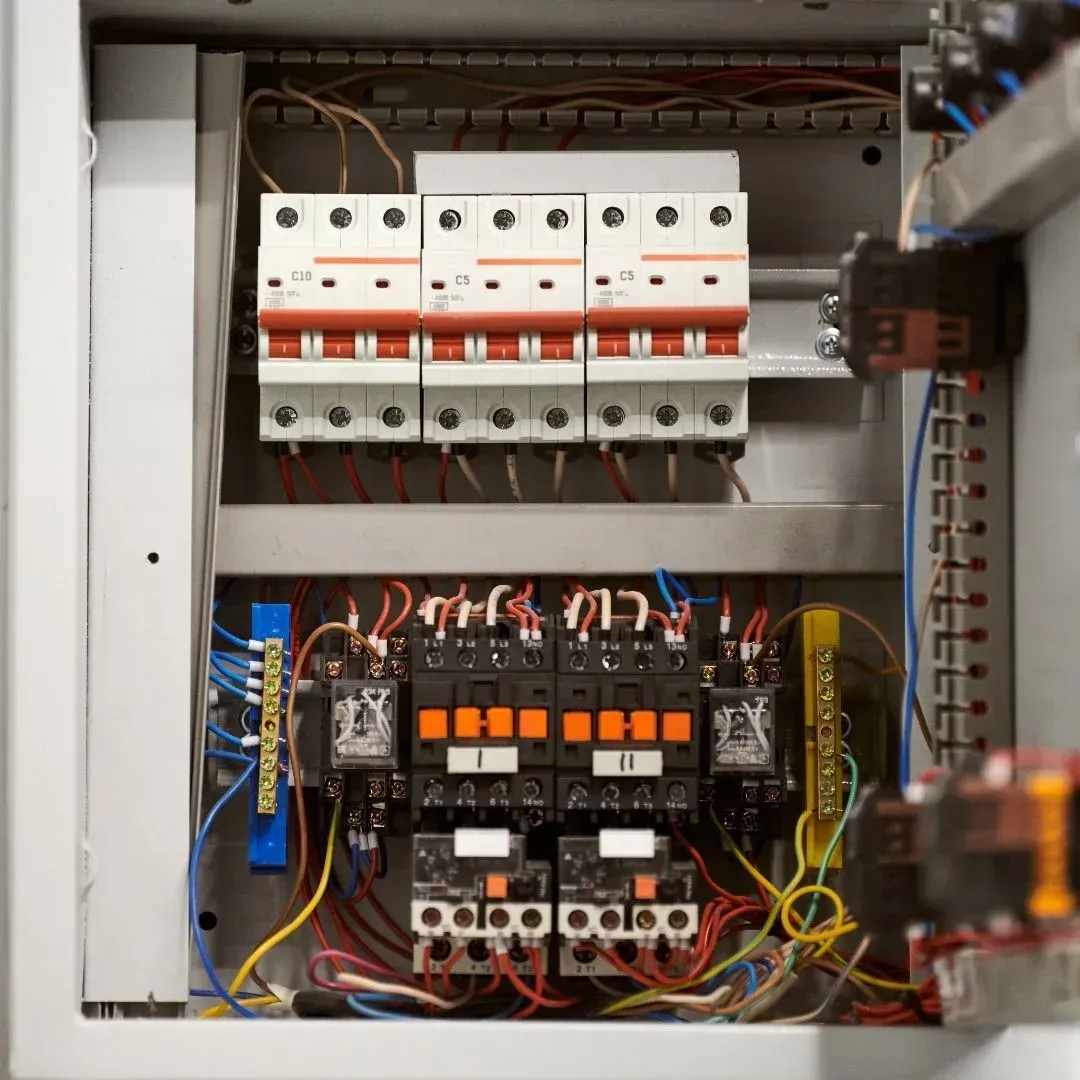 Close-up of circuit breakers and wiring inside an electrical panel during a Bronx, NY upgrade