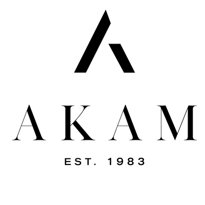 AKAM logo with black stylized “A” above serif text and “EST. 1983” below on white background