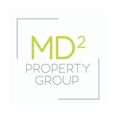 MD² Property Group logo in lime green and gray with minimalist corner frame lines