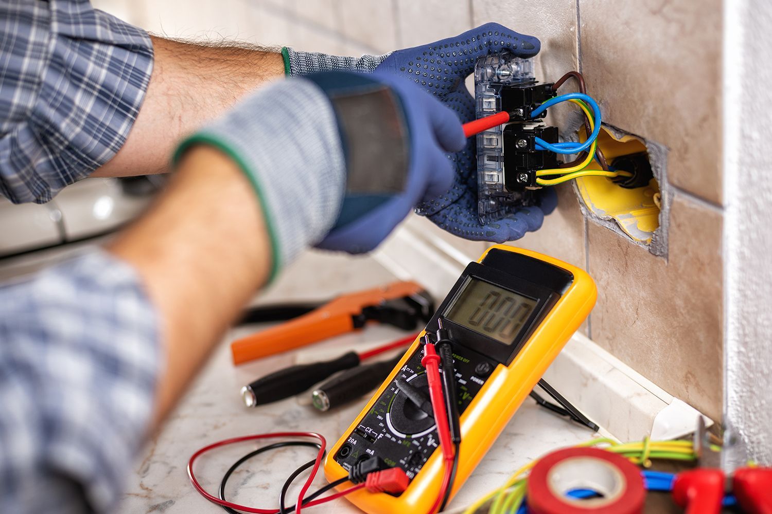 Skilled electrician representing best safety practices during electrical system maintenance.