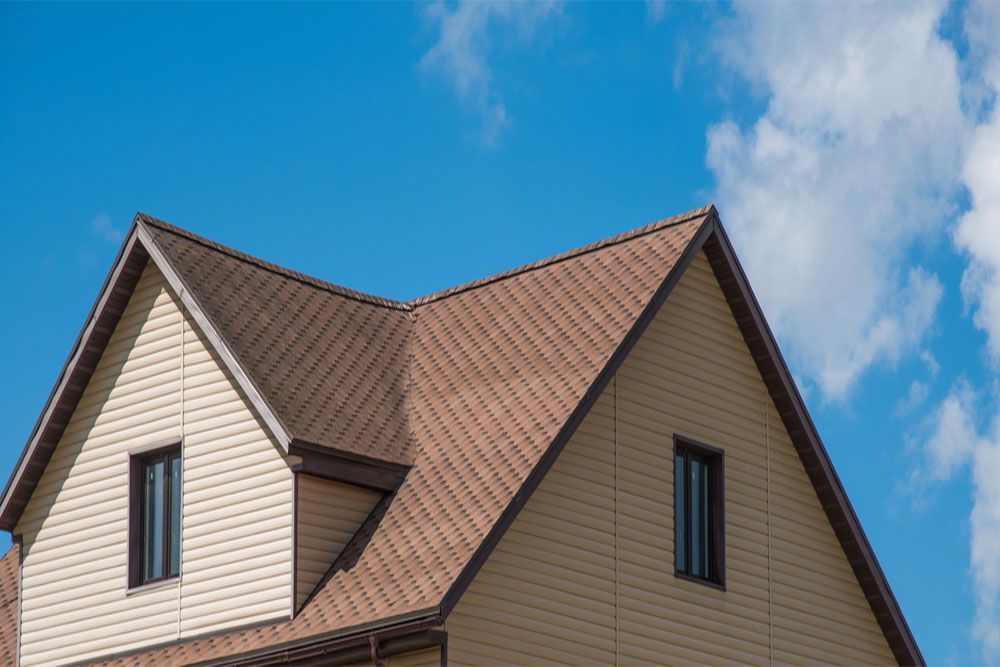 Composition Roof Vs. Asphalt Shingles: Which Should You Choose?