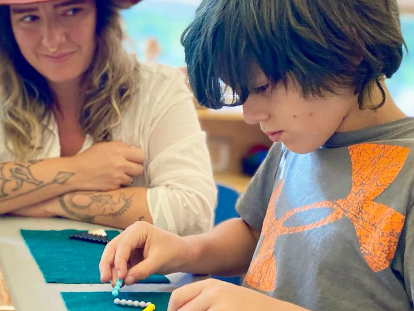 image of elementary aged child focusing on work