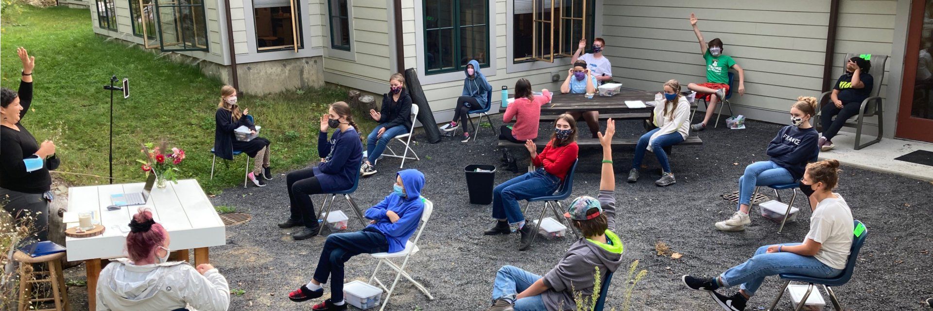 Group of adolescent students in an outdoor class