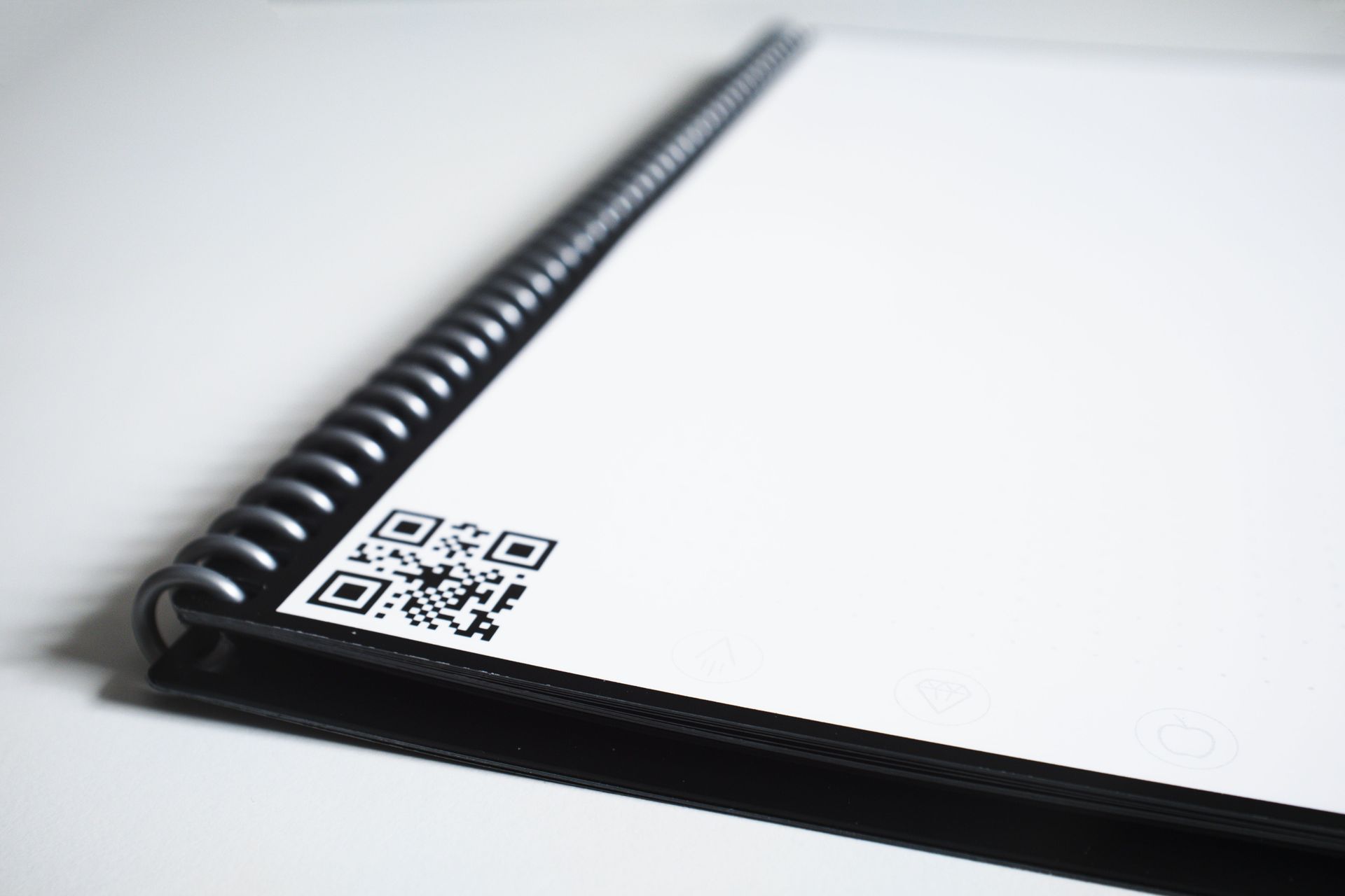 Coil-bound presentation booklet open