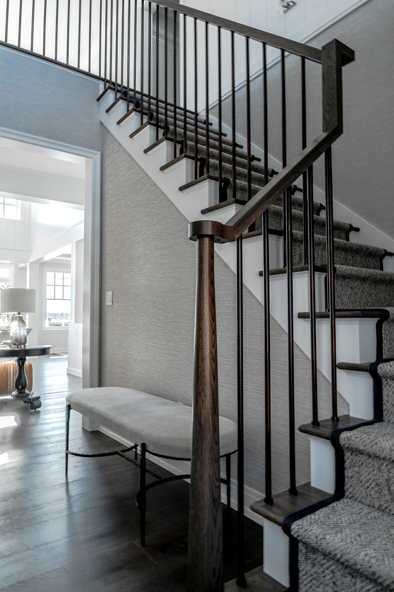 Wood floor with matching stair treads. 