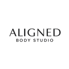 Aligned Body Studio logo on a cream background, with black serif text.