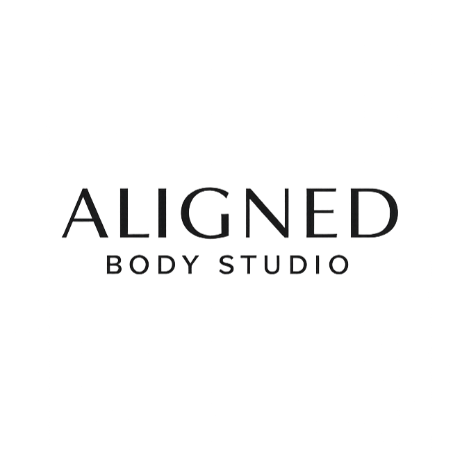 Aligned Body Studio logo on a cream background, with black serif text.