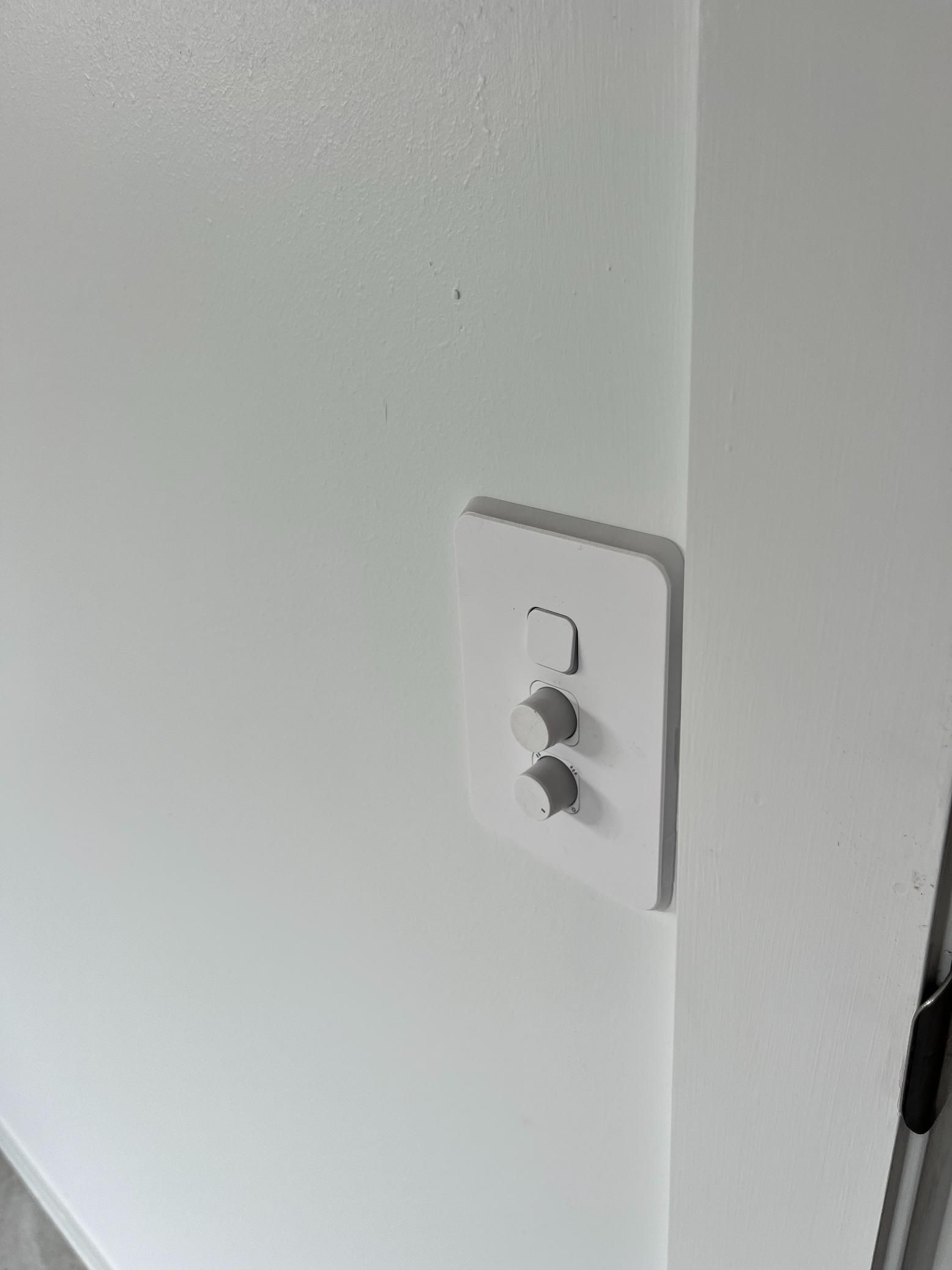 White Light Switch Plate on a White Wall — JPower Energy in Kamerunga, QLD