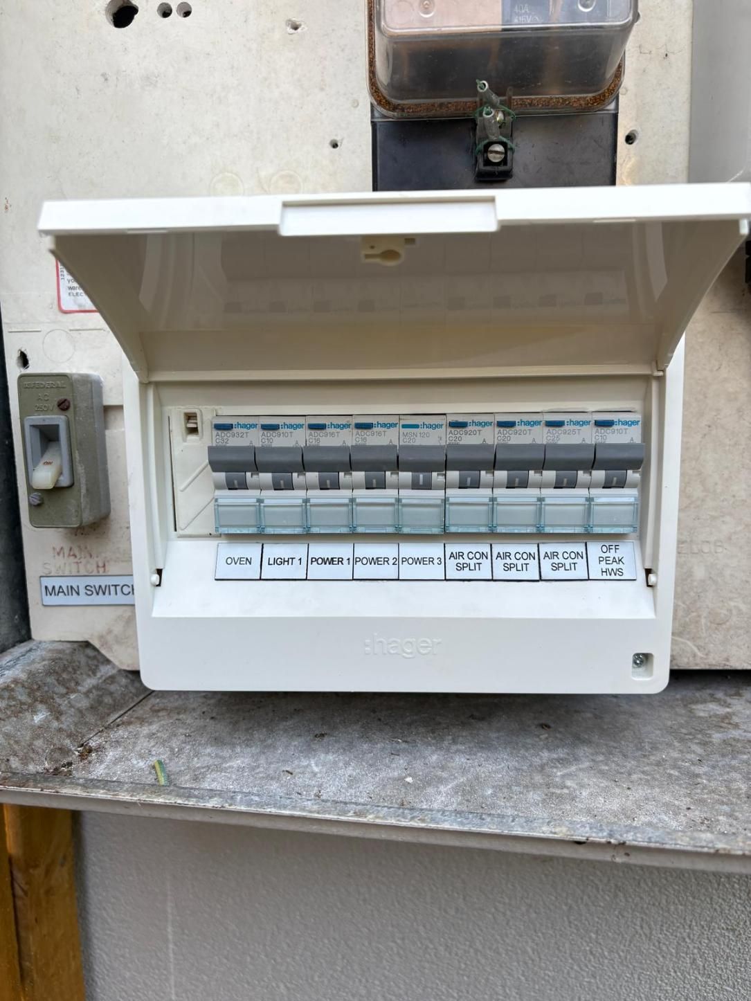 Electrical Fuse Box With the Door Open, Revealing Circuit Breakers — JPower Energy in Kamerunga, QLD