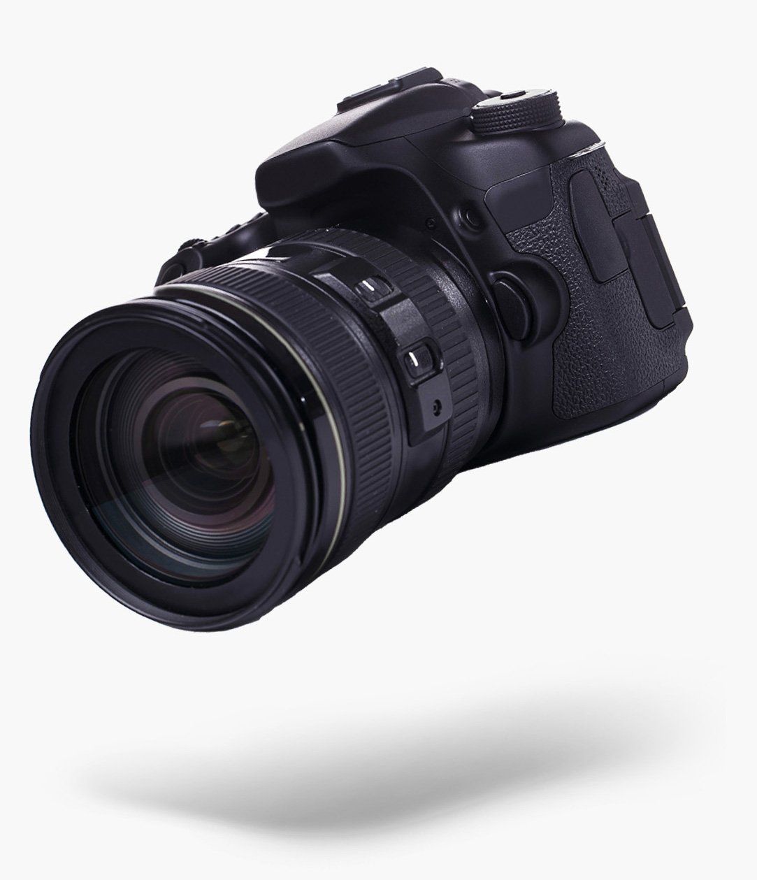 Black DSLR camera angled downwards, casting a shadow below.