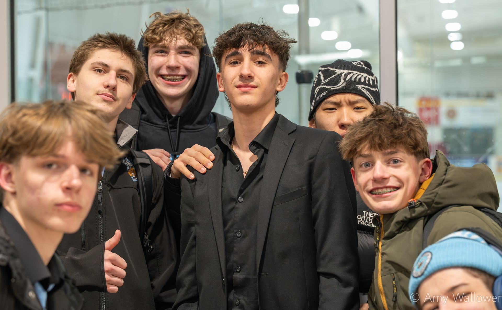 Moose players smiling at the camera.