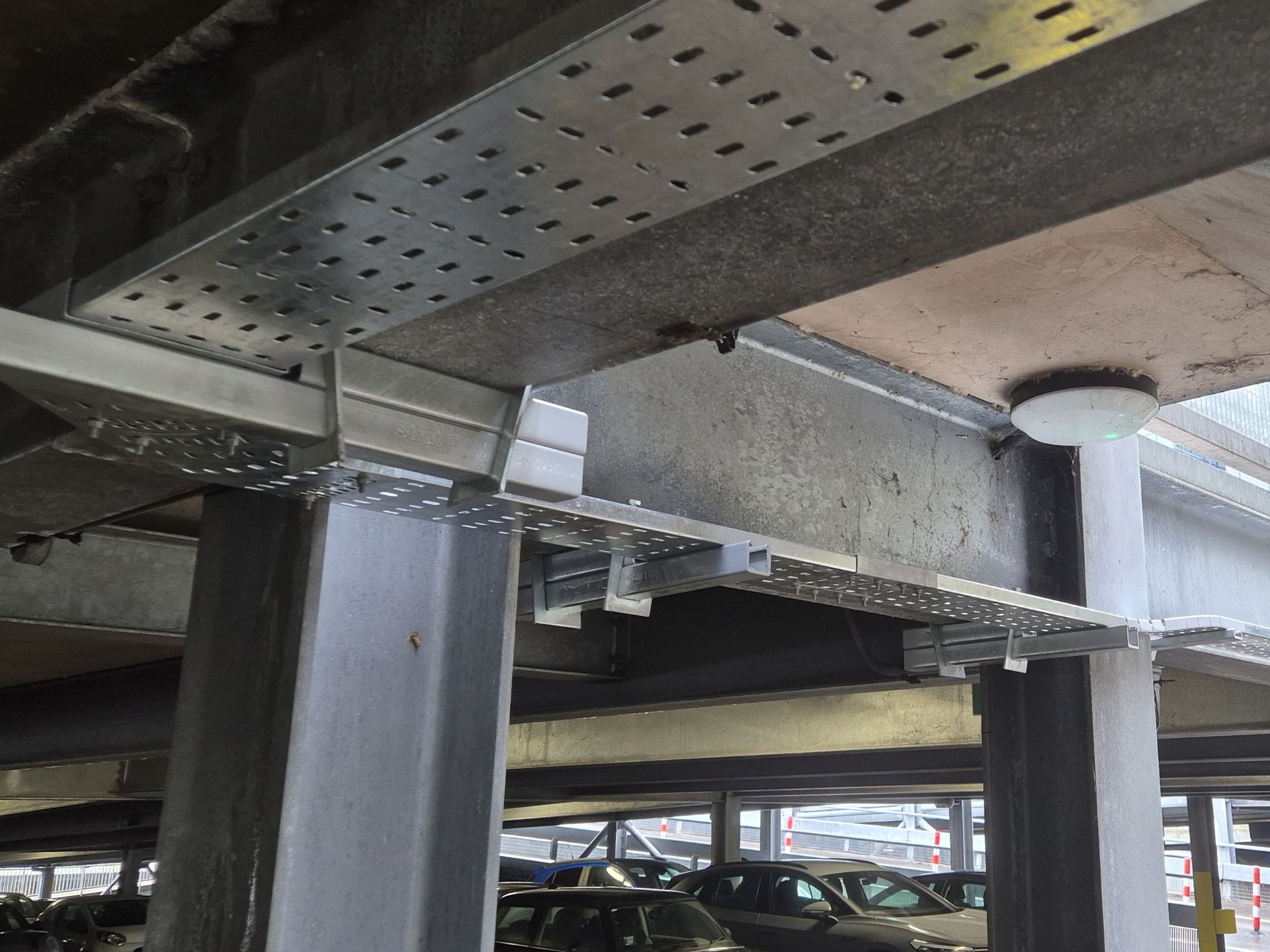 Galvanised steel cable tray installation in car park for EV chargers - Matt Browning Electrical Contractors