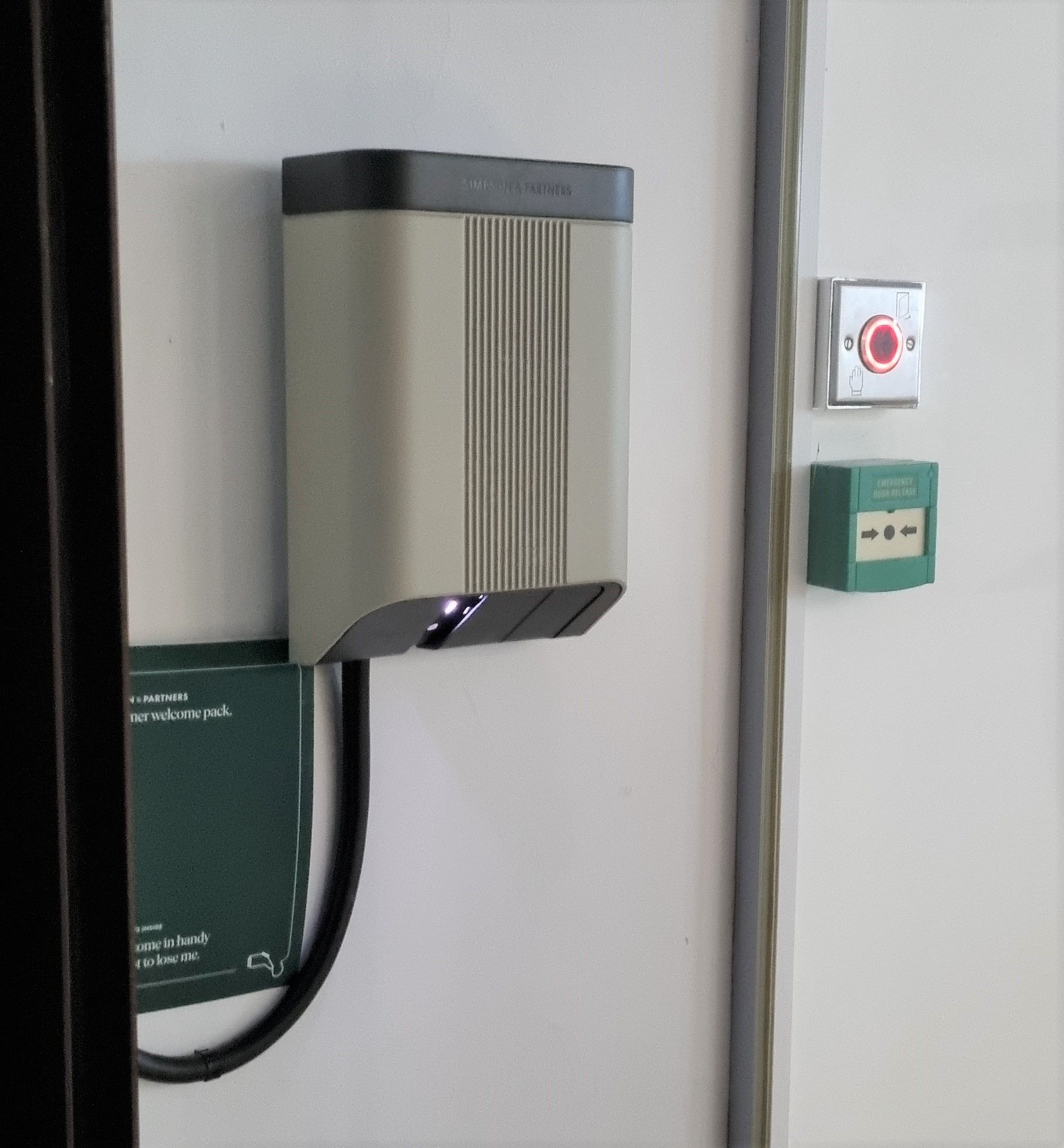 Simpsons & Partners car charge point located to the side of the entrance lobby