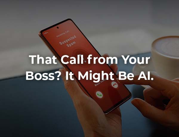 Hand holding a smartphone with red screen and call alert text: “That Call from Your Boss? It Might Be AI.”