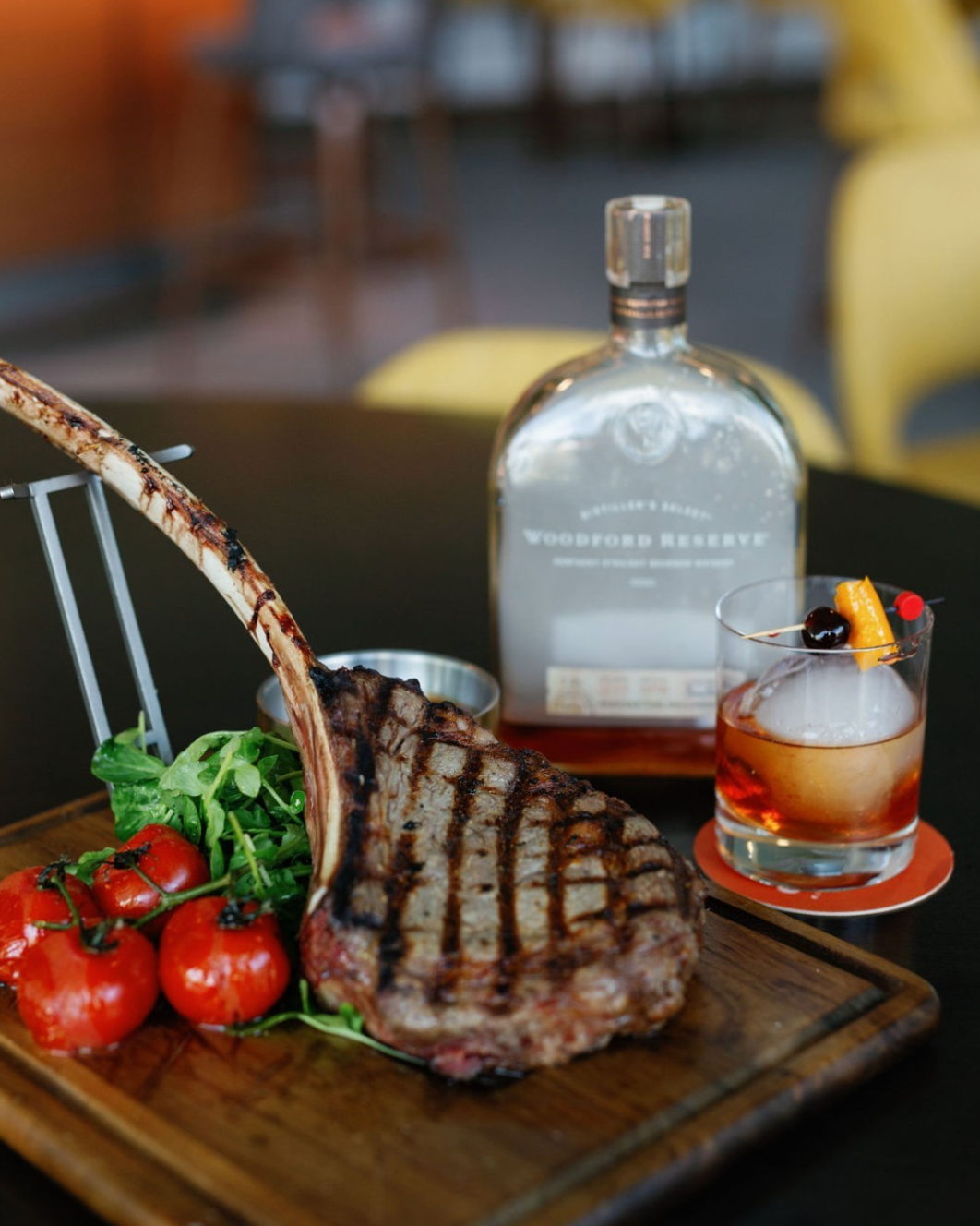 A rack of lamb and a fancy whiskey cocktail at Covey Kitchen Restaurant.