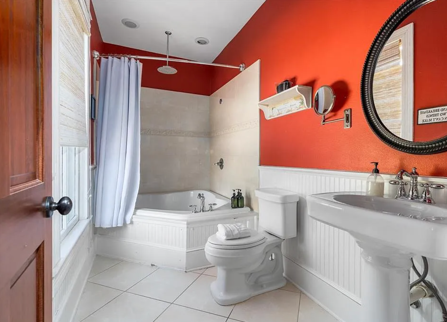 Red bathroom with whirlpool tub