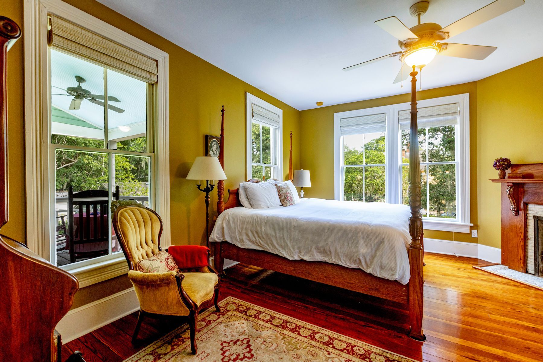 Wooden bed in The Camellia Rose Inn - STR - Vacation Rental - VRBO - AirBNB