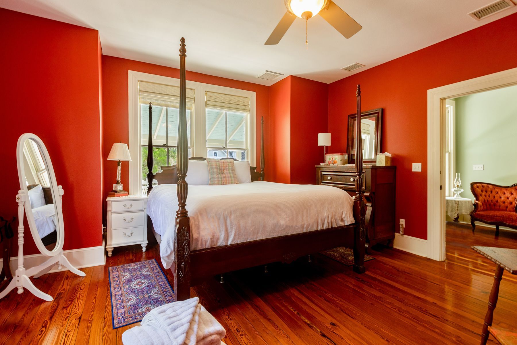 Wooden bed in The Camellia Rose Inn - STR - Vacation Rental - VRBO - AirBNB