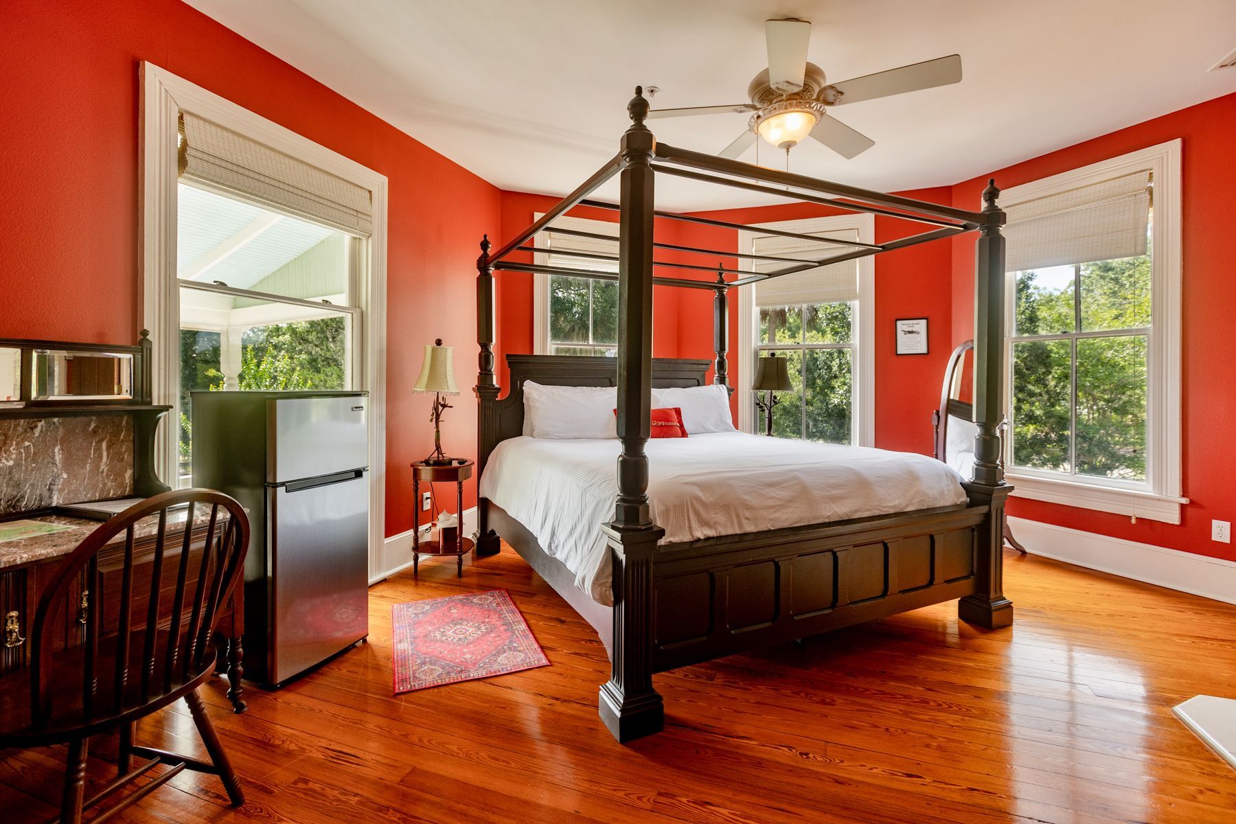 Wooden bed in The Camellia Rose Inn - STR - Vacation Rental - VRBO - AirBNB