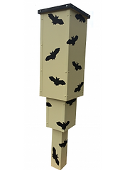 Tall beige bat house with black bat silhouettes on a post