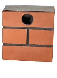 Orange brick box with a round hole and gray top, resembling a birdhouse or nesting box