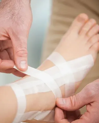 Barefoot Being Bandaged By A Doctor - Lombard, IL - Zimmerman Scott A DPM