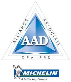 A blue triangle with the word aad on it
