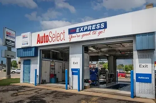 A white and blue building with a sign that says autoselect express