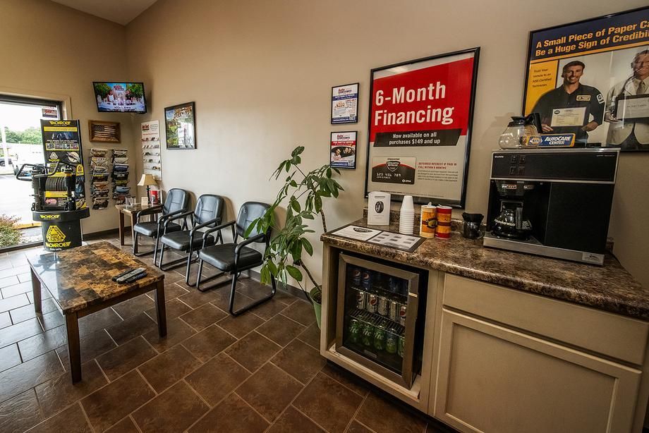 A waiting room with a sign that says 6 month financing