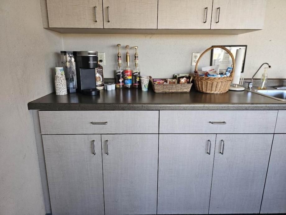 A kitchen counter with a basket on top of it