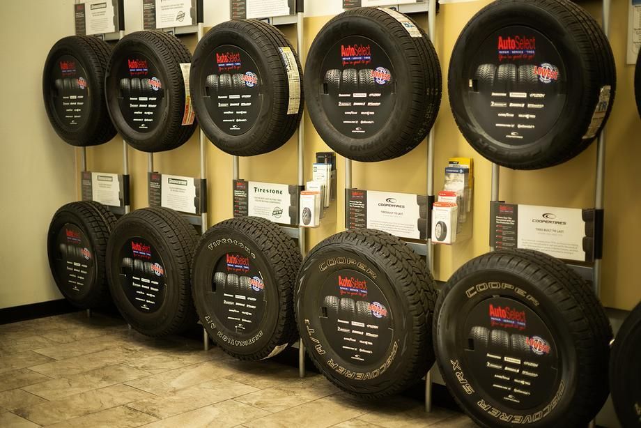 A row of tires on display in a store
