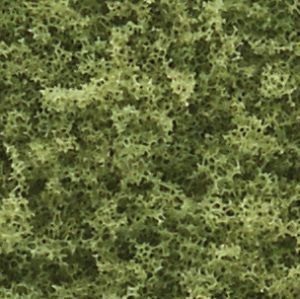 Abstract green mottled texture with dark speckles and lighter patches
