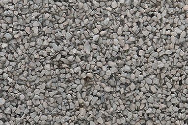 Gray gravel stones filling the frame, showing a close-up textured surface